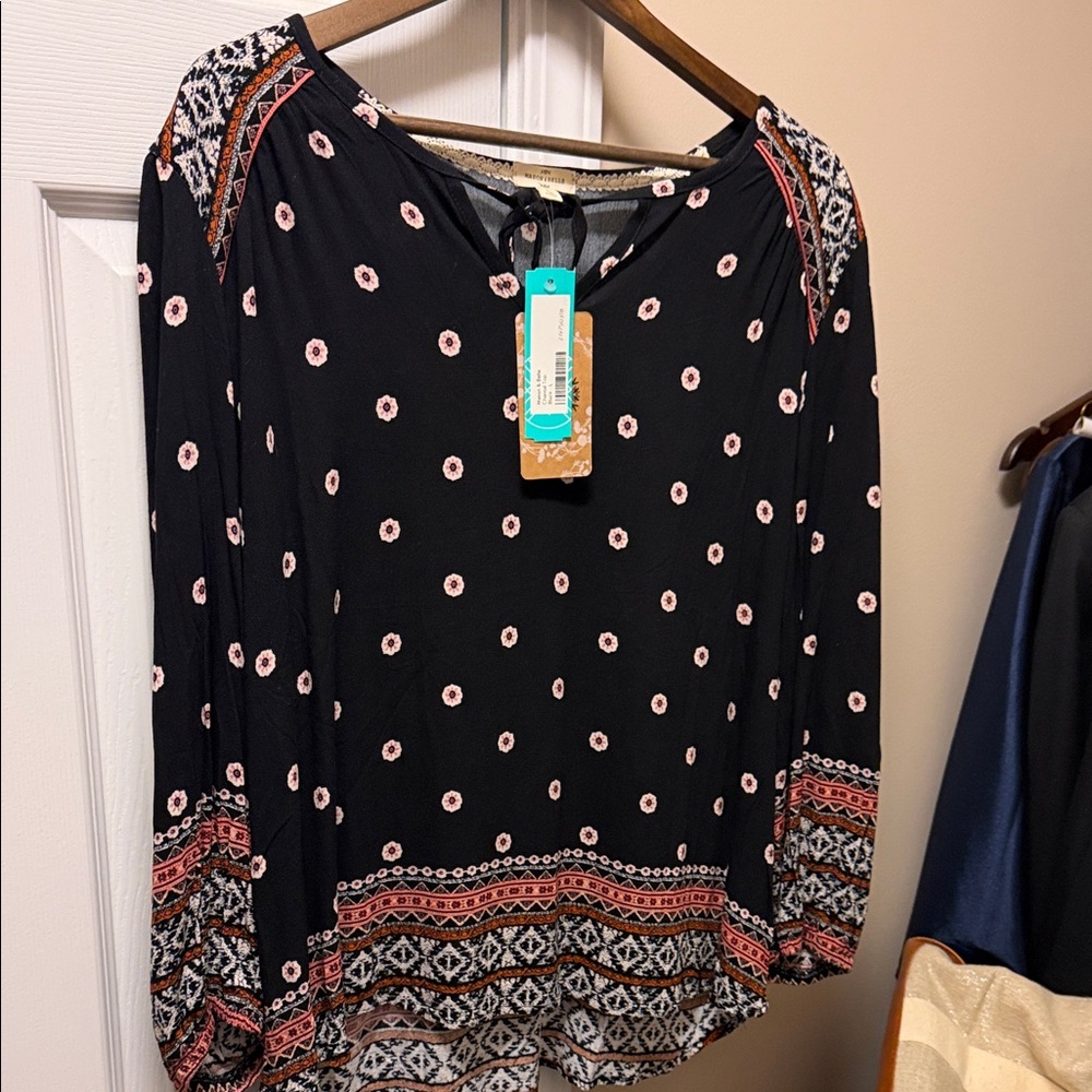 Elegant Black Blouse with Red and White Patterns